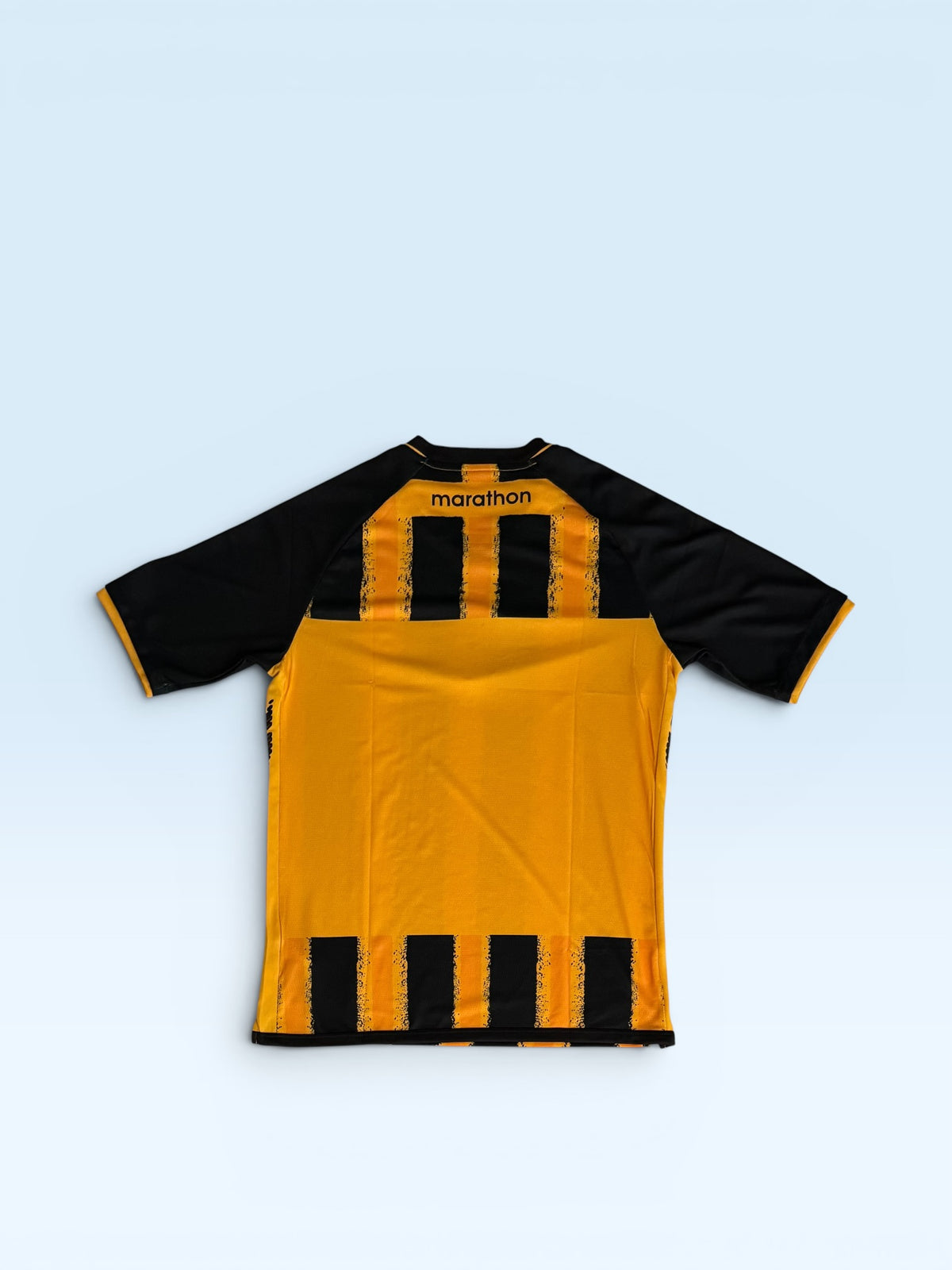 The Strongest 2025-26 black and gold home soccer jersey, Bolivia Marathon kit – photo 2